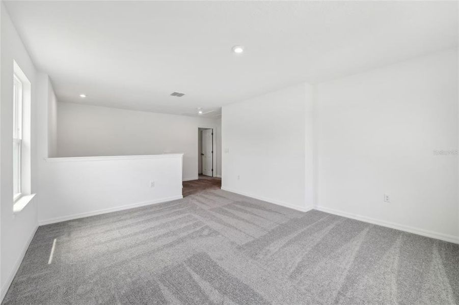 Spacious, unfurnished interior of a new home in Brack Ranch, St. Cloud (Image 33).