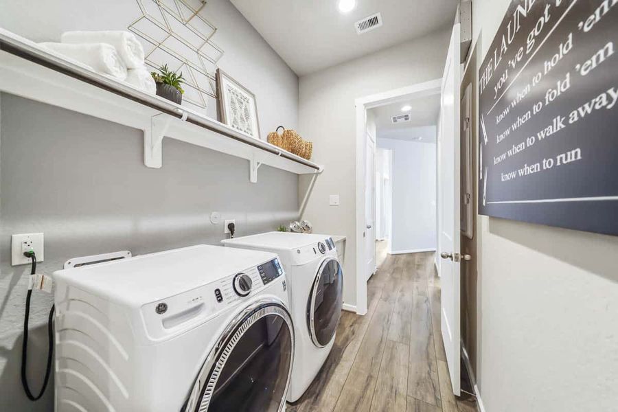 Representative furnished interior of a home built from the Oakley by Chesmar Homes in The Trails, New Caney (Image 11).