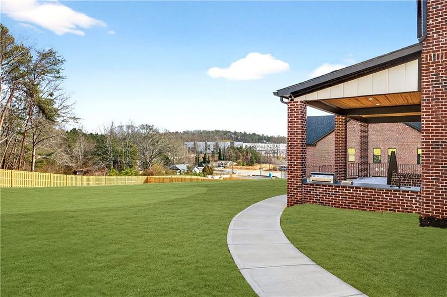 Exterior details and patio area of a home in , Buford (Image 4). Exterior details and patio area of a home in , Buford (Image 4).