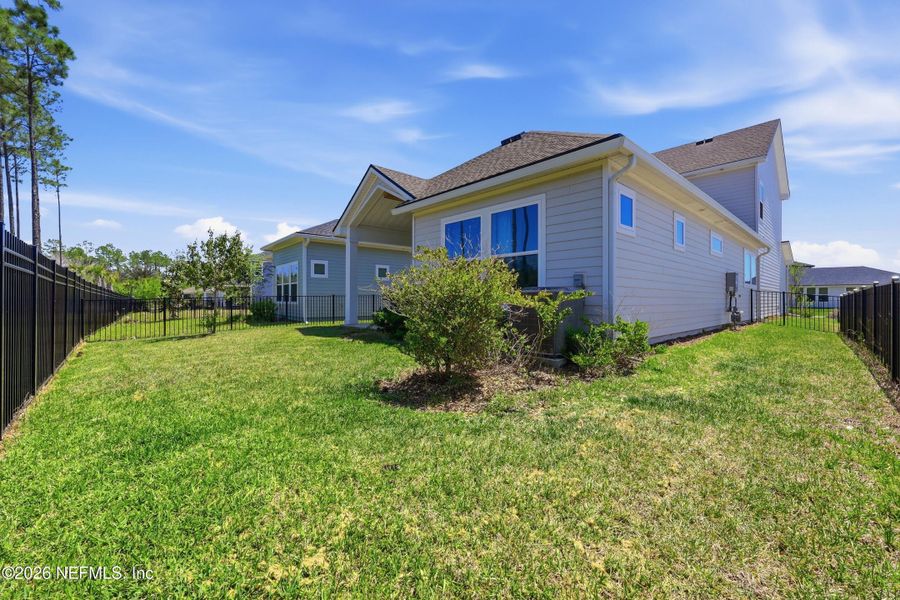 Exterior details and patio area of a home in Crosswinds 40’, Ponte Vedra (Image 4).