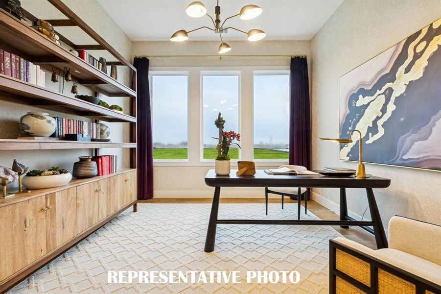 Whether it's working from home or enjoying a good book, you will appreciate this light and spacious home office.  REPRESENTATIVE PHOTO