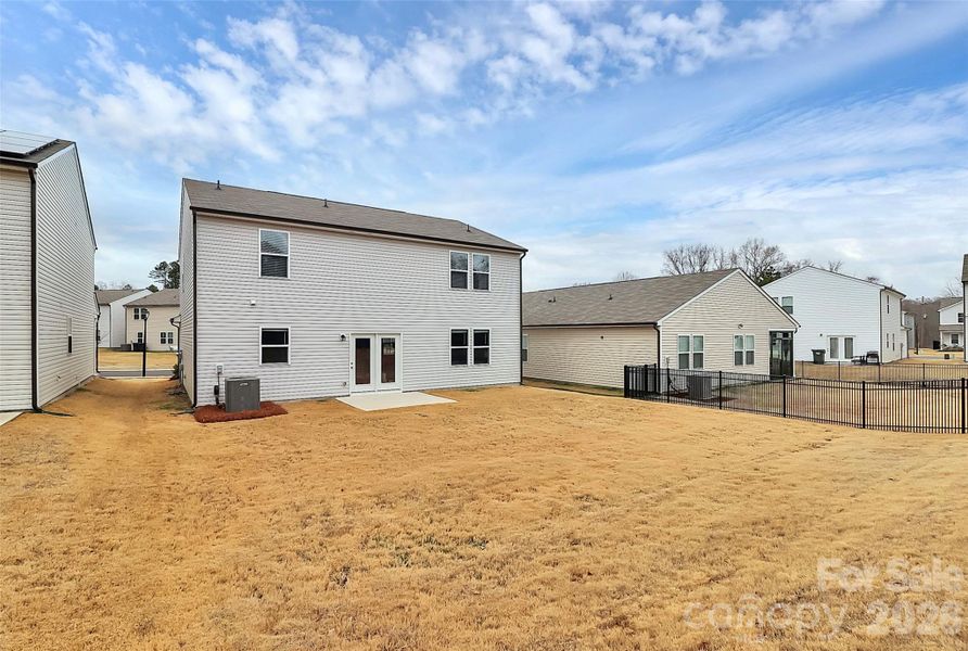 Exterior details and patio area of a home in Sunbriar, Charlotte (Image 3).