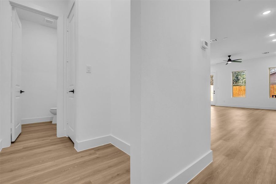 Powder Bathroom located at hall from garage and Kitchen with area for more storage. Powder Bathroom located at hall from garage and Kitchen with area for more storage.