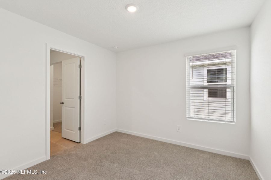 Spacious, unfurnished interior of a new home in Lakes at Bella Lago - Signature Series, Green Cove Springs (Image 25). Spacious, unfurnished interior of a new home in Lakes at Bella Lago - Signature Series, Green Cove Springs (Image 25).