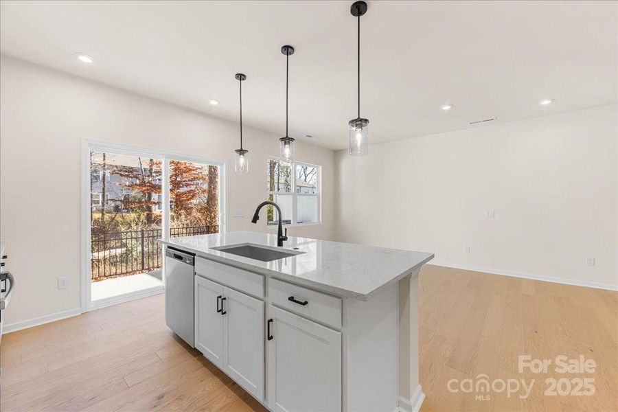 Large Central Island Ideal for Casual Dining or Entertaining.