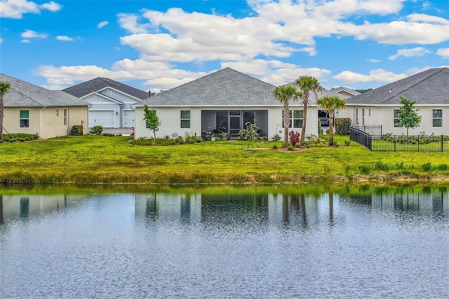 Front exterior of a new home in , Punta Gorda, FL, highlighting curb appeal (Image 2).