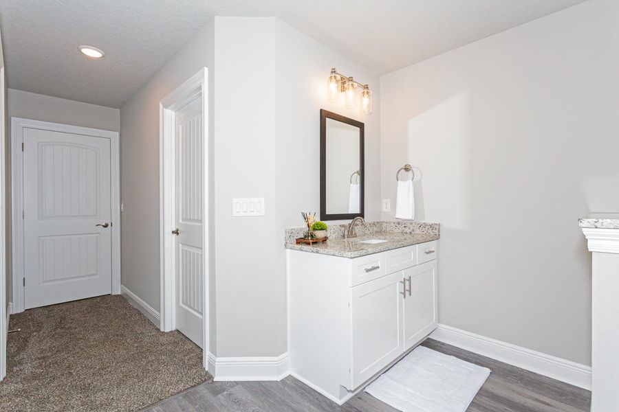 Representative furnished interior of a home built from the The Turquoise by Herbst Homes in Walther Reserve, Milton (Image 82).