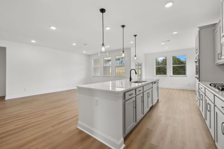 Kitchen & Living Room | For representation purposes only. Options and layout may vary by community and home plan. Kitchen & Living Room | For representation purposes only. Options and layout may vary by community and home plan.