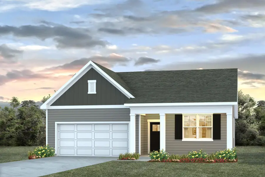 Front exterior of a new home in Pine Hills at Cane Bay, Summerville, SC, highlighting curb appeal (Image 1). Front exterior of a new home in Pine Hills at Cane Bay, Summerville, SC, highlighting curb appeal (Image 1).