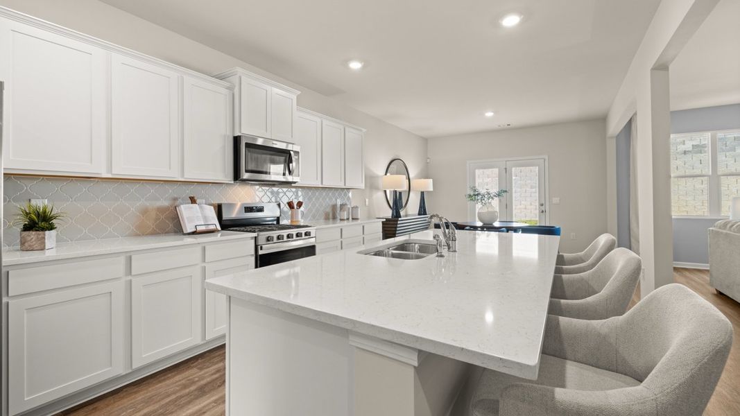 Representative furnished interior of a home built from the Halton by D.R. Horton in Brooks Station, Dacula (Image 13).