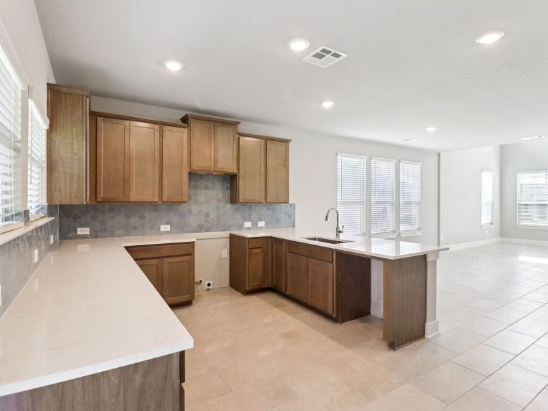 Furnished interior view inside a new home in Kallison Ranch, San Antonio (Image 6).