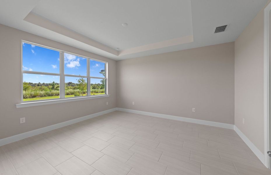 Owner's private suite featuring a drop tray ceiling Owner's private suite featuring a drop tray ceiling