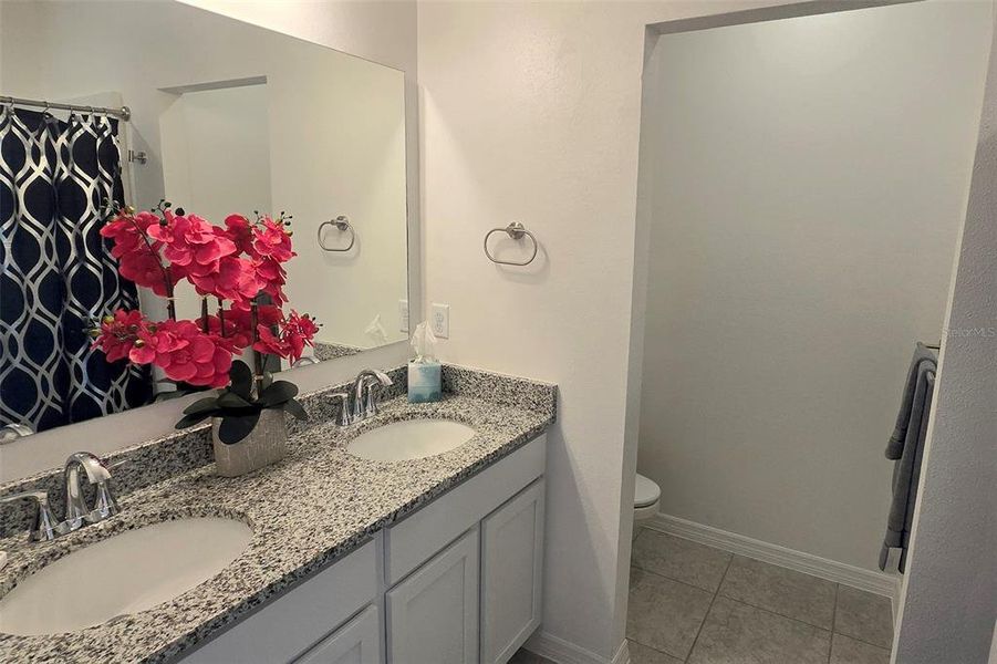 Furnished interior view inside a new home in Hammock Reserve, Haines City (Image 10).