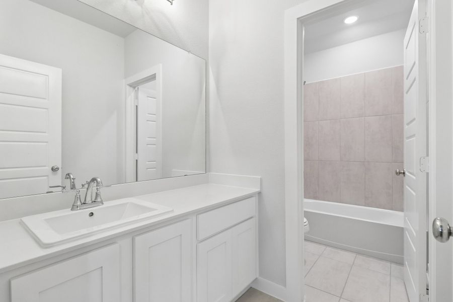 Secondary Bathroom in the Masters home plan by Trophy Signature Homes