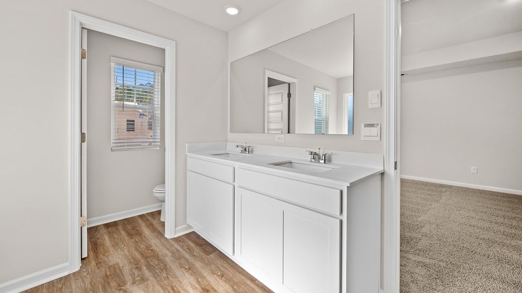 Representative furnished interior of a home built from the Saratoga by D.R. Horton in Poplar Preserve, Newnan (Image 9).