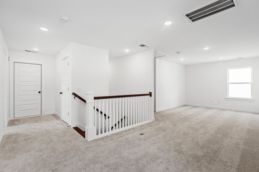 Representative unfurnished interior of a home built from the The Cedar D by Davidson Homes LLC in Saddle Creek Ranch, Cibolo (Image 21).