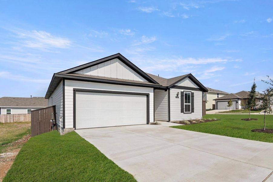 Front exterior of a new home in Cloverleaf, Austin, TX, highlighting curb appeal (Image 20).