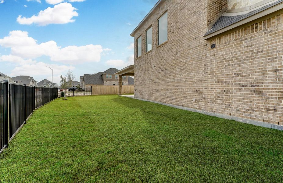 Exterior details and patio area of a home in Bridgeland 60′, Cypress (Image 26).