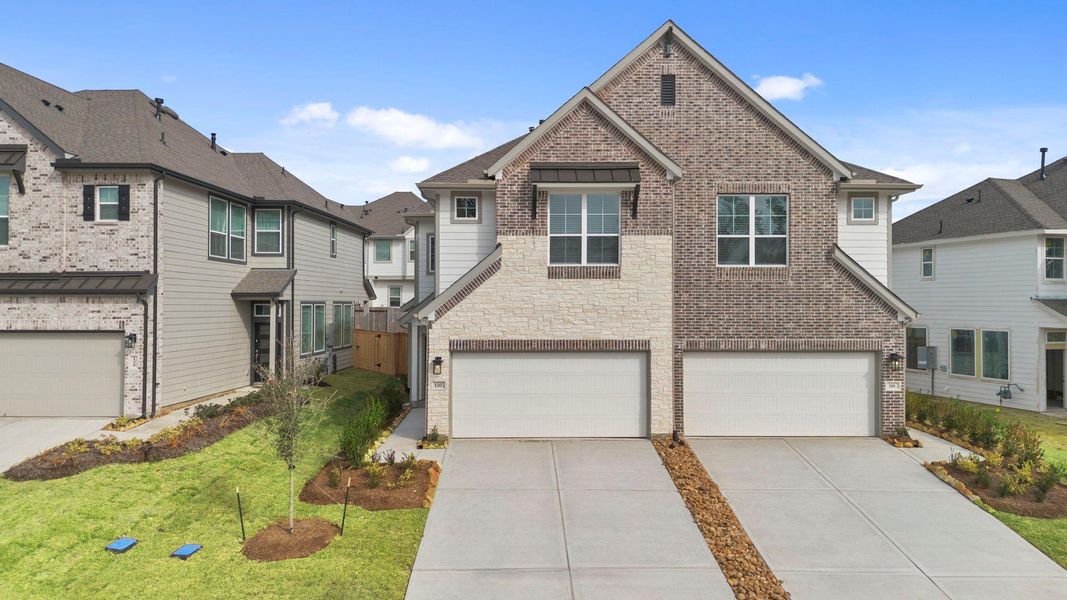 Front exterior of a new home in Woodforest, Montgomery, TX, highlighting curb appeal (Image 1). Front exterior of a new home in Woodforest, Montgomery, TX, highlighting curb appeal (Image 1).