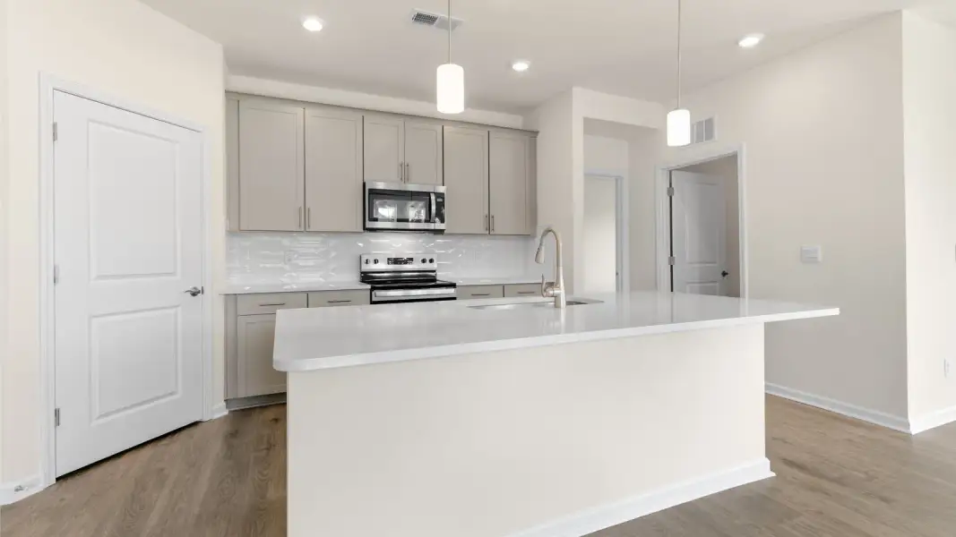 Furnished interior view inside a new home in The Villas at Galvins Ridge, Sanford (Image 5).