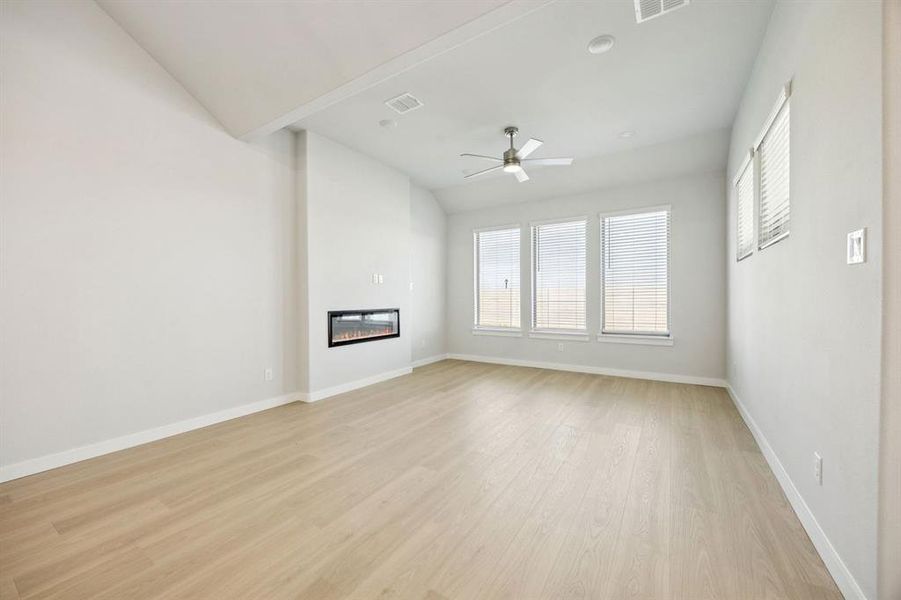 Living Room in the Wimbledon home plan by Trophy Signature Homes – REPRESENTATIVE PHOTO Living Room in the Wimbledon home plan by Trophy Signature Homes – REPRESENTATIVE PHOTO