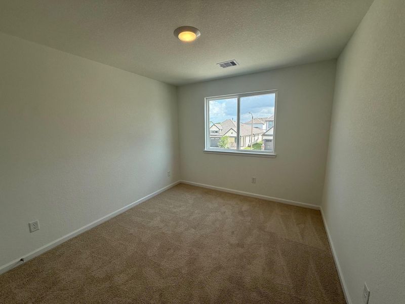 Spacious, unfurnished interior of a new home in Midtown Reserve, College Station (Image 12).
