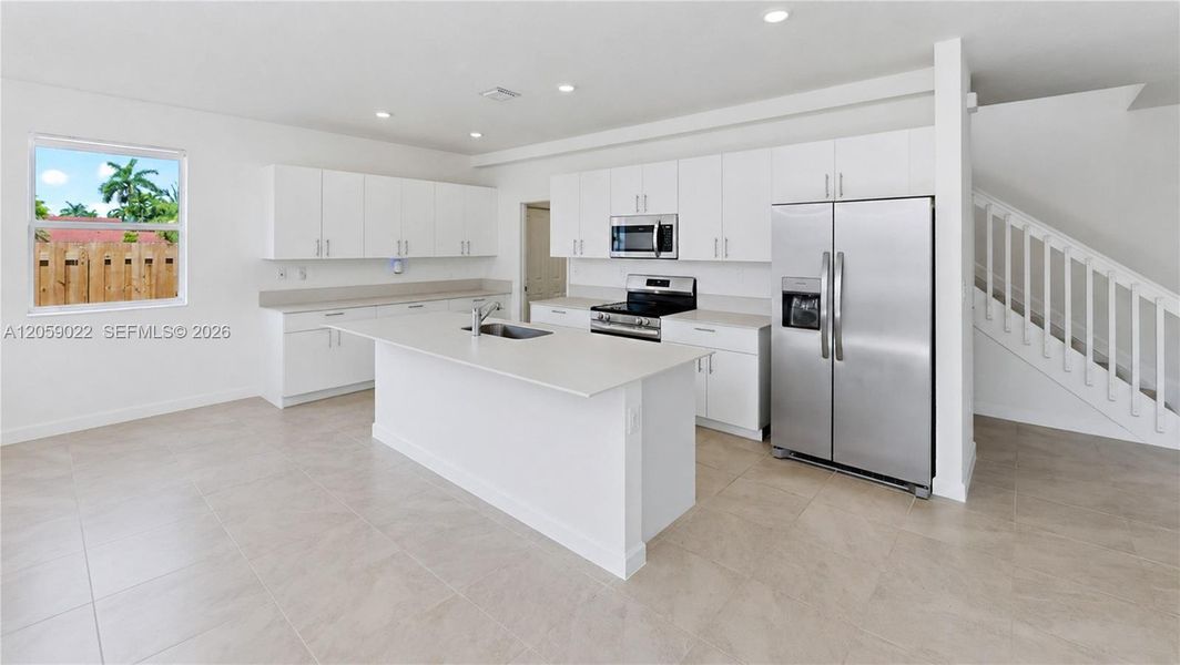 Furnished interior view inside a new home in , Homestead (Image 14). Furnished interior view inside a new home in , Homestead (Image 14).