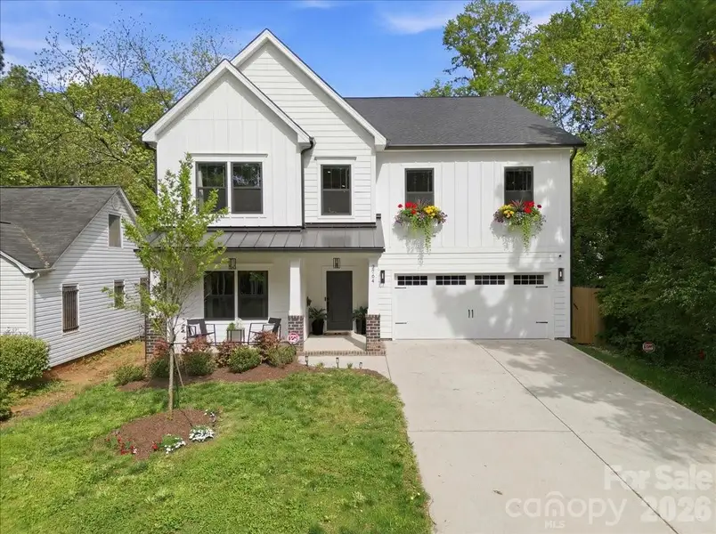 Front exterior of a new home in , Charlotte, NC, highlighting curb appeal (Image 1). Front exterior of a new home in , Charlotte, NC, highlighting curb appeal (Image 1).