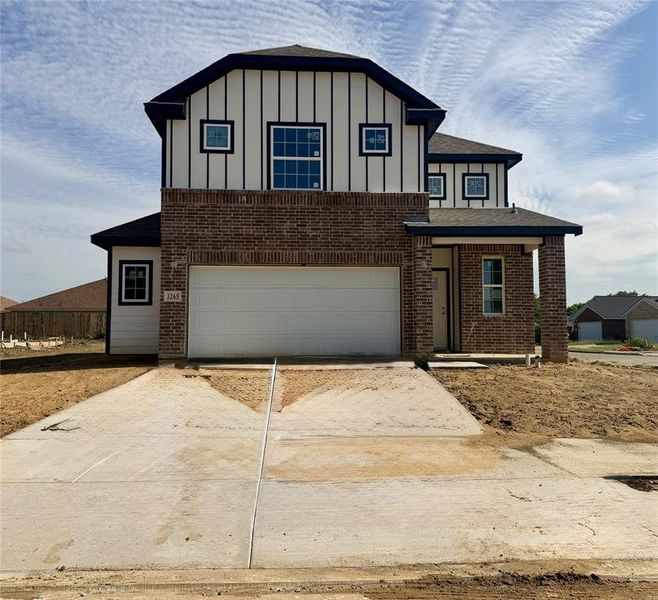 Front exterior of a new home in Hanna Ranch, Fort Worth, TX, highlighting curb appeal (Image 2). Front exterior of a new home in Hanna Ranch, Fort Worth, TX, highlighting curb appeal (Image 2).
