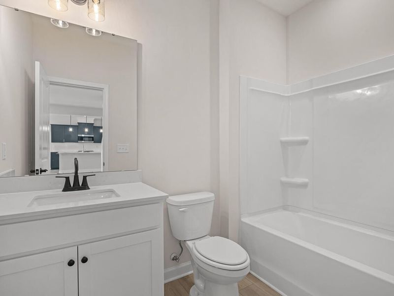 Furnished interior view inside a new home in Tobacco Road, Angier (Image 7).