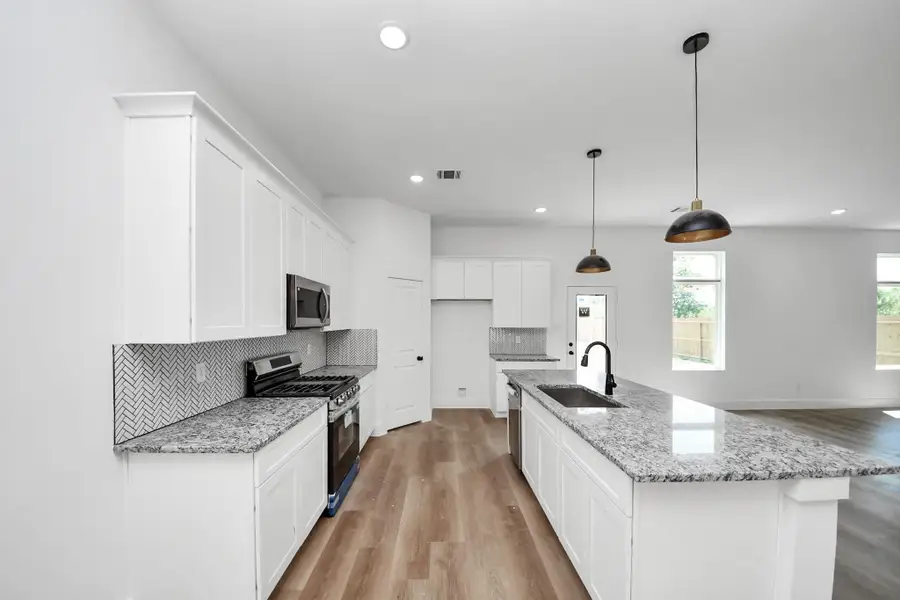 Furnished interior view inside a new home in , Huffman (Image 9).
