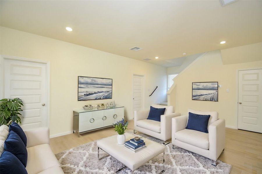 This inviting living space boasts a bright, open layout, perfect for modern living.