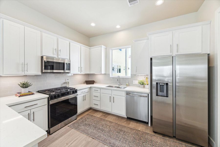 Furnished interior view inside a new home in White Oak Station, Houston (Image 4).