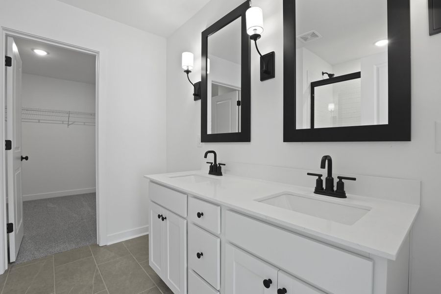 Primary bath featuring dual sinks