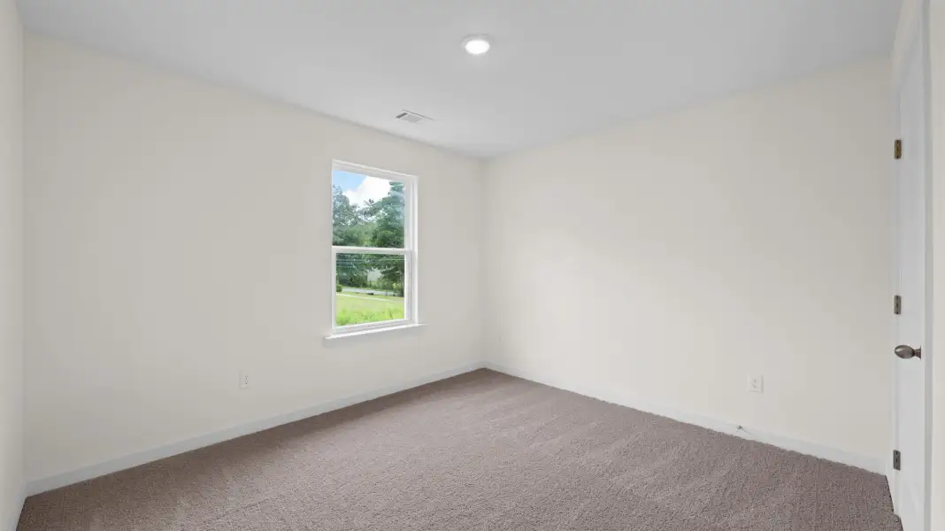 Representative unfurnished interior of a home built from the Tatum Townhome by D.R. Horton in Cherokee Overlook, Sevierville (Image 22).