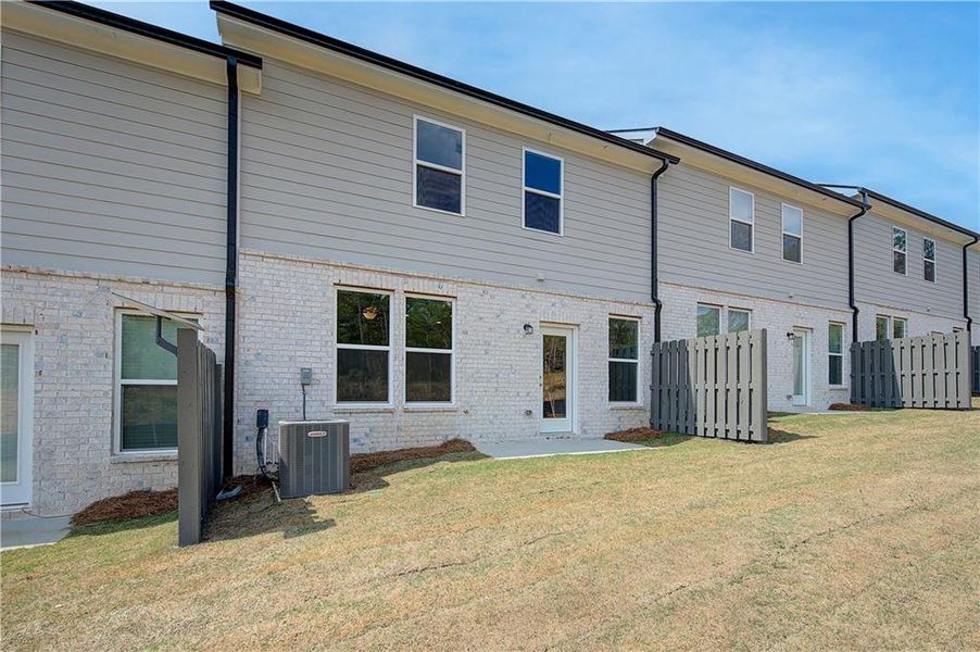Exterior details and patio area of a home in Diamante, Stockbridge (Image 18).