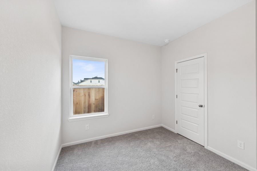 The Cardinal II- Bedroom 2. Photos of home shown are for illustration only; actual features, colors, and upgrades may vary.