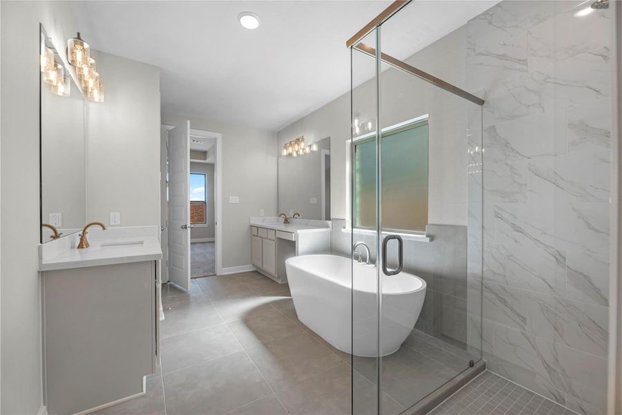 Furnished interior view inside a new home in Sunterra, Katy (Image 8).