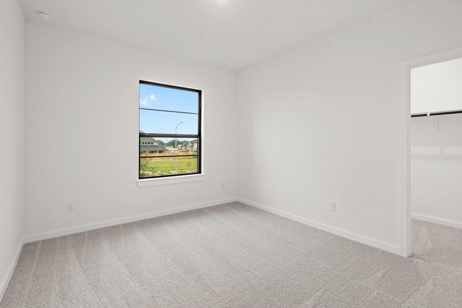 Spacious, unfurnished interior of a new home in Legacy Prairie at Katy Court 60', Katy (Image 12).