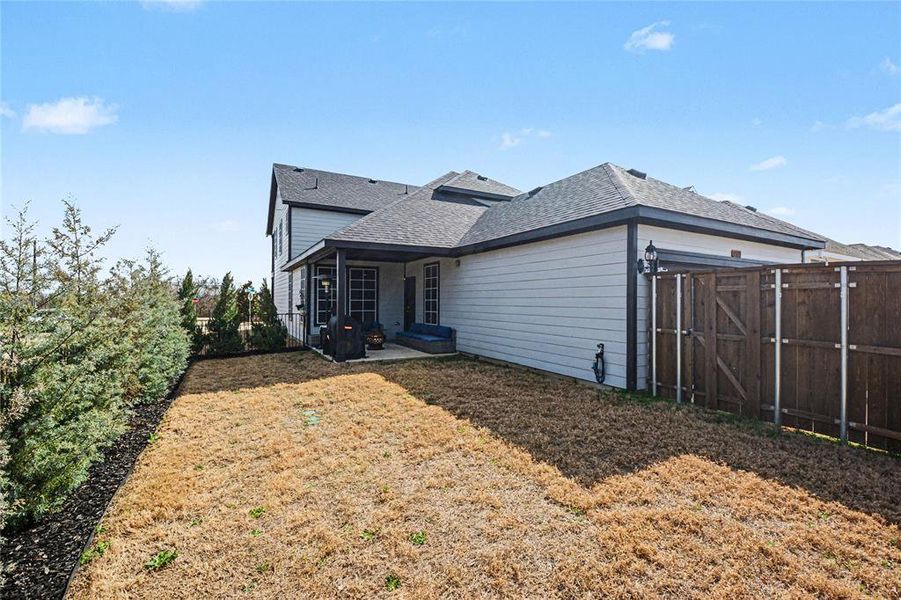 Exterior details and patio area of a home in , Rowlett (Image 3).
