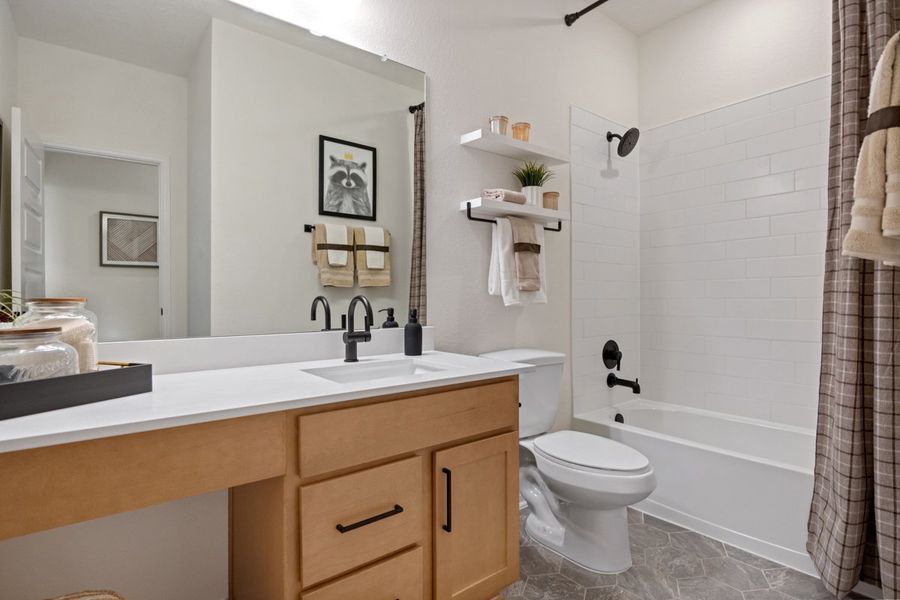 Representative furnished interior of a home built from the 2003 Modeled by KB Home in Sweetgrass Village, Crosby (Image 10).