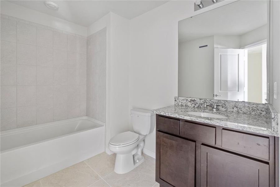 Furnished interior view inside a new home in , Kissimmee (Image 5). Furnished interior view inside a new home in , Kissimmee (Image 5).