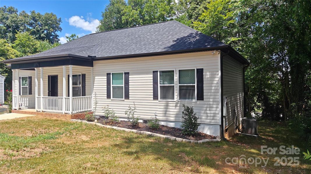 Front exterior of a new home in , Gastonia, NC, highlighting curb appeal (Image 17).