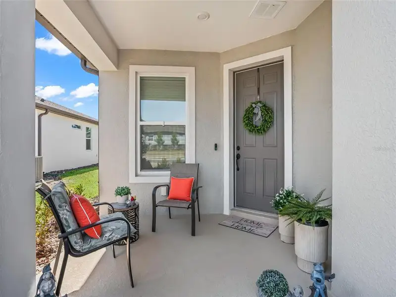 Exterior details and patio area of a home in Del Webb Stone Creek, Ocala (Image 3).