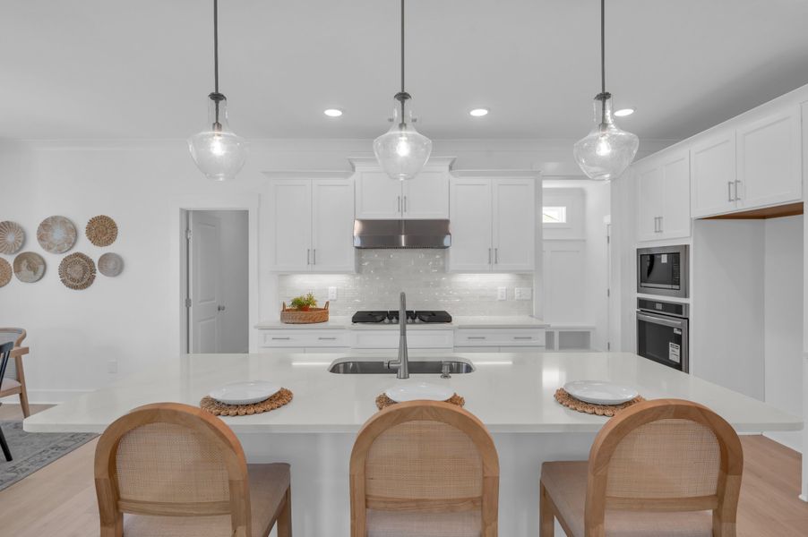Representative furnished interior of a home built from the The Whitley by RobuckHomes in Windwater, Hampstead (Image 20).