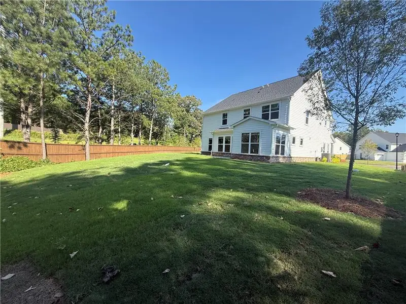 Exterior details and patio area of a home in Rose Creek, Cumming (Image 2).