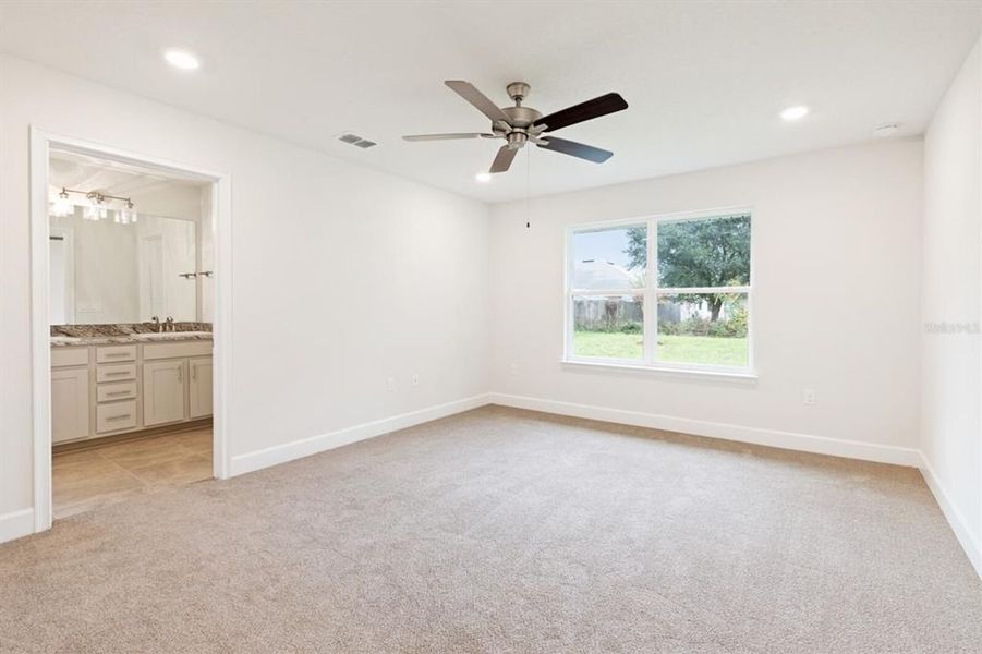 Representative unfurnished interior of a home built from the 1540 by Adams Homes in Okeechobee, Okeechobee (Image 18).