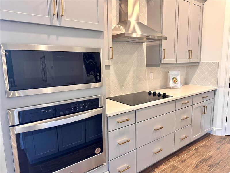 Kitchen has Built-in Ovens and Cooktop