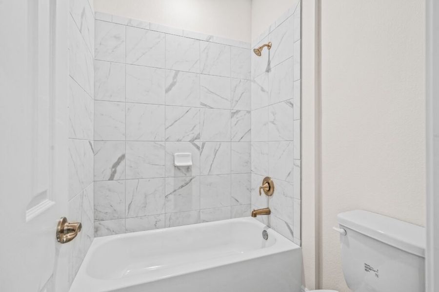 Furnished interior view inside a new home in Windswept Estates, Freeport (Image 10).