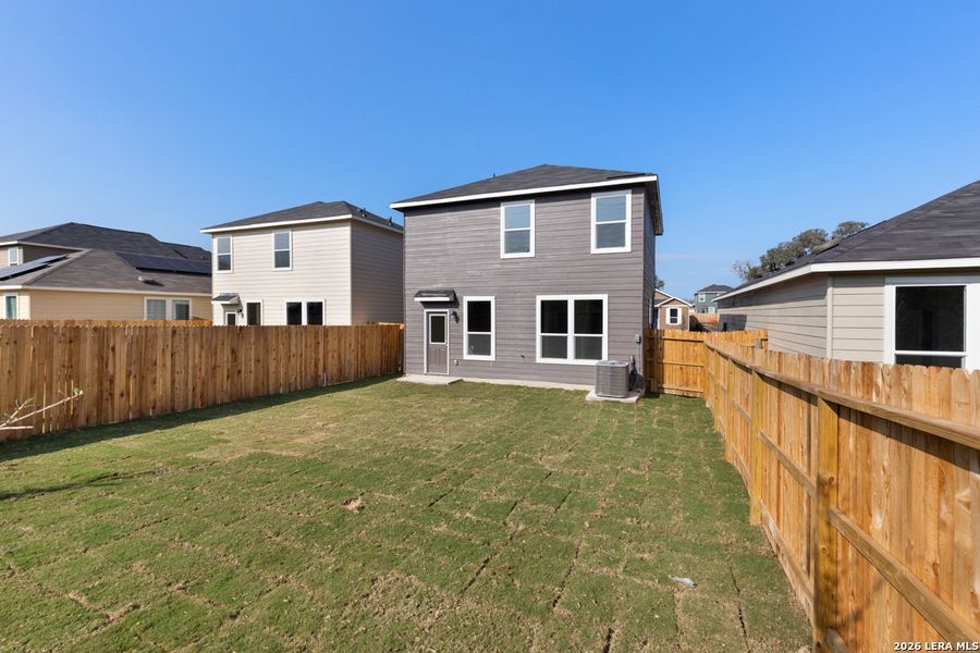 Exterior details and patio area of a home in Spanish Trails Villas, San Antonio (Image 24).